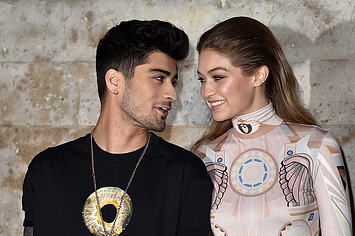 Zayn and Gigi at a black tie event looking longingly into each other's eyes