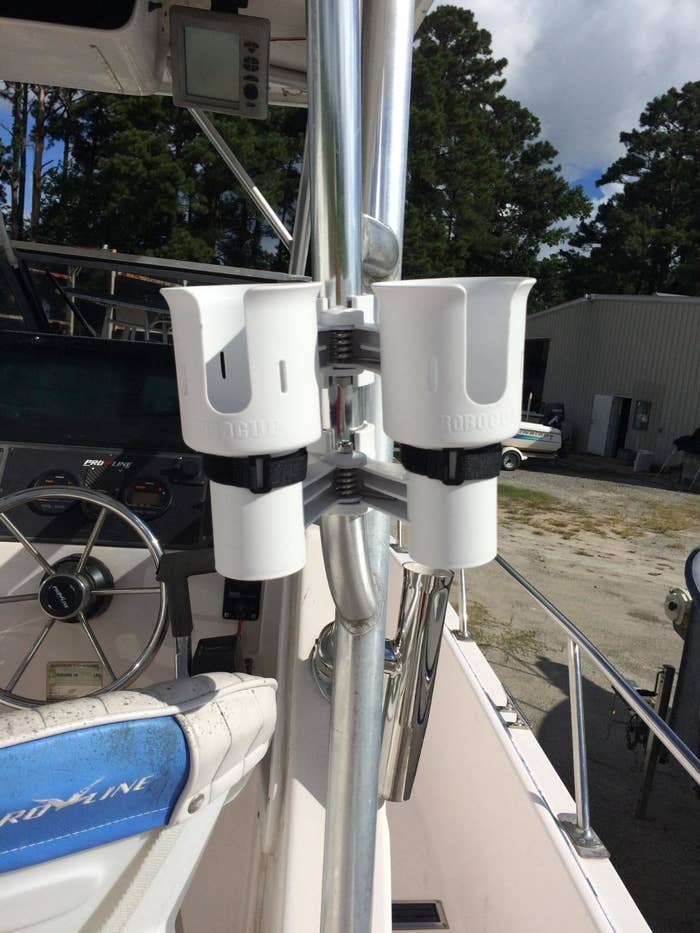 Reviewer photo of the cup holder attached to the side of a boat