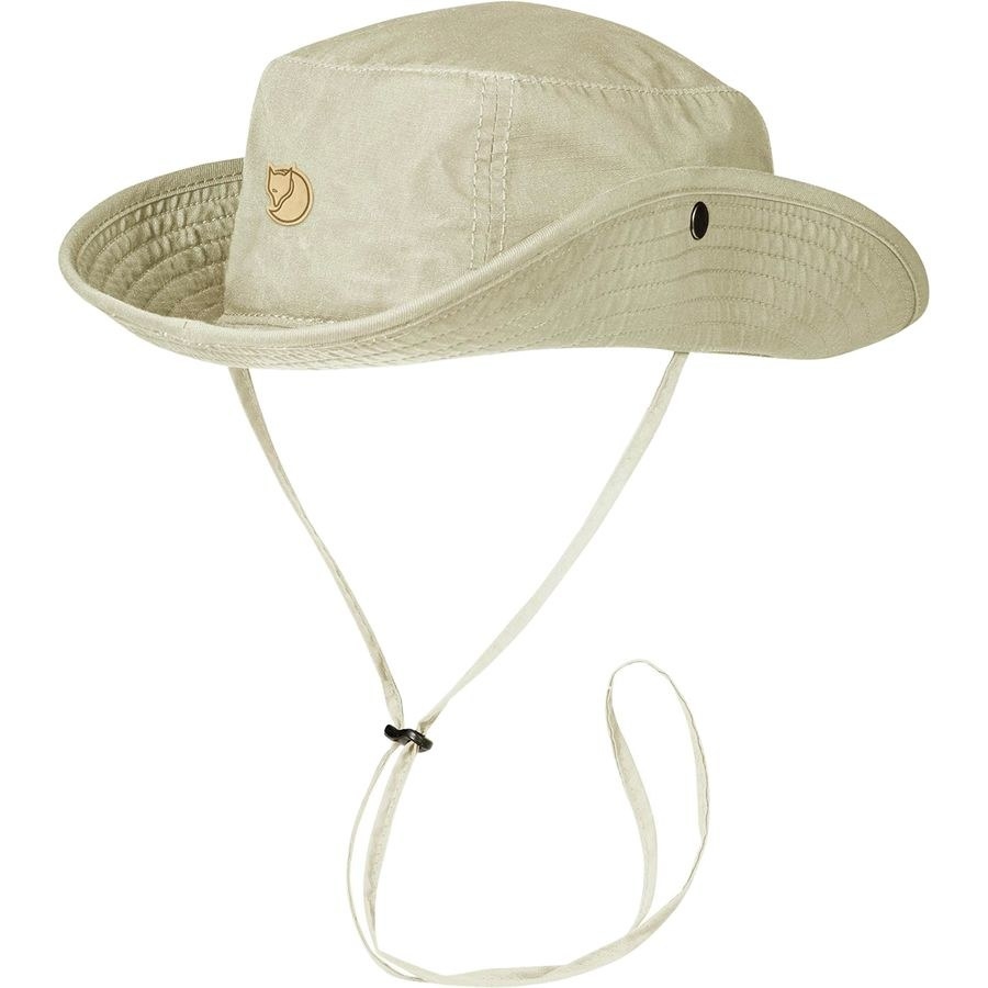 A khaki wide brimmed hat with a chin strap 