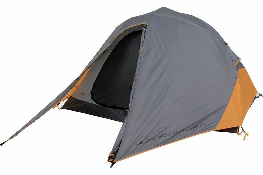 A gray tent with orange accents 