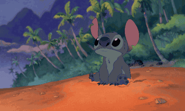 Gif of Stitch burying his feet in the sand