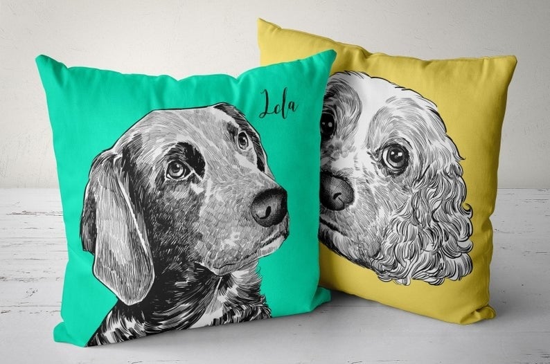 A green and yellow pillow, each with illustrated photos of dogs on them