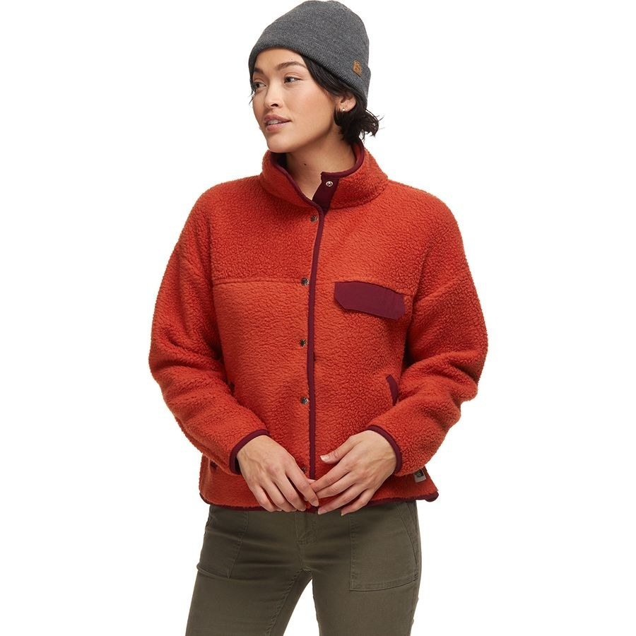 A model in a red North Face fleece 