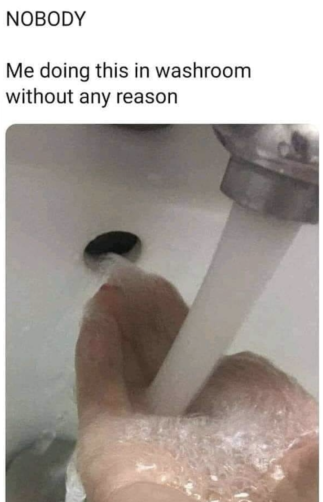 Picture of a hand bending water into that little hole in a sink