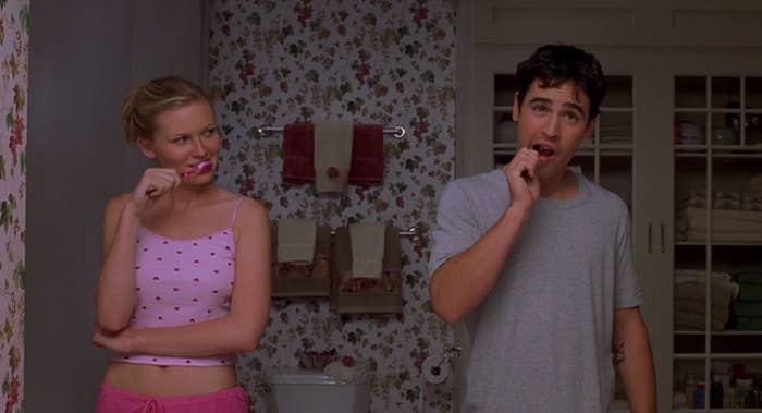 Torrance and Cliff brushing their teeth together in Bring It On
