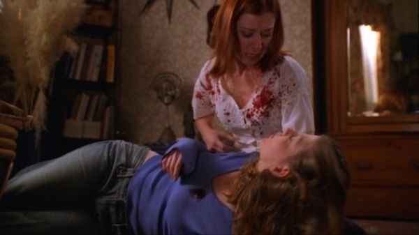 Willow watches as Tara dies