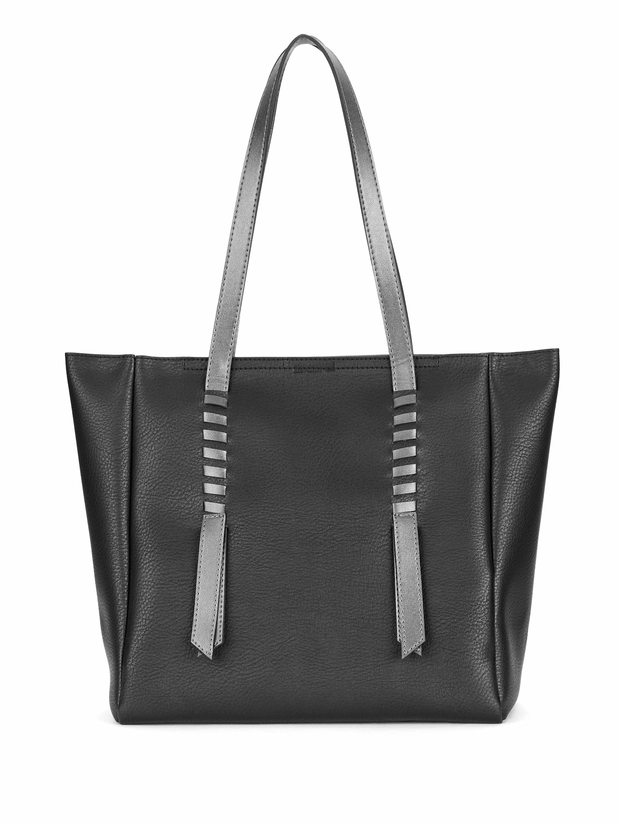 The tote bag in black with silver straps