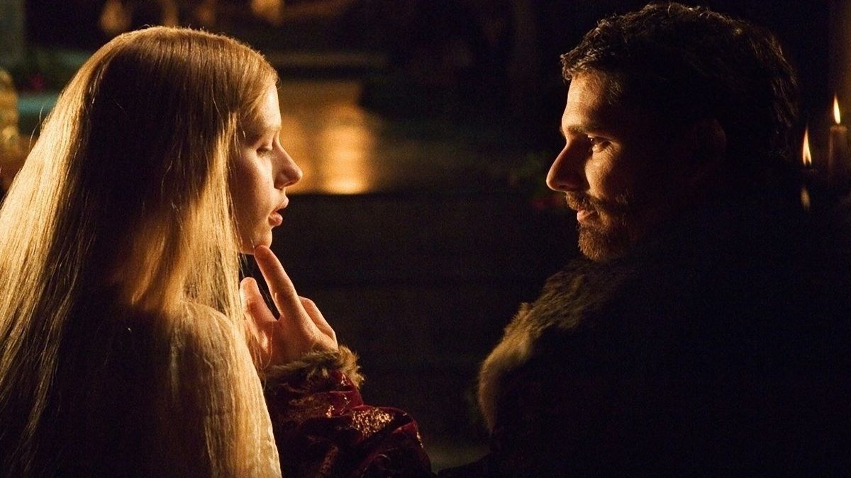 A man romantically touches the chin of Scarlett Johansson in The Other Boleyn Girl 