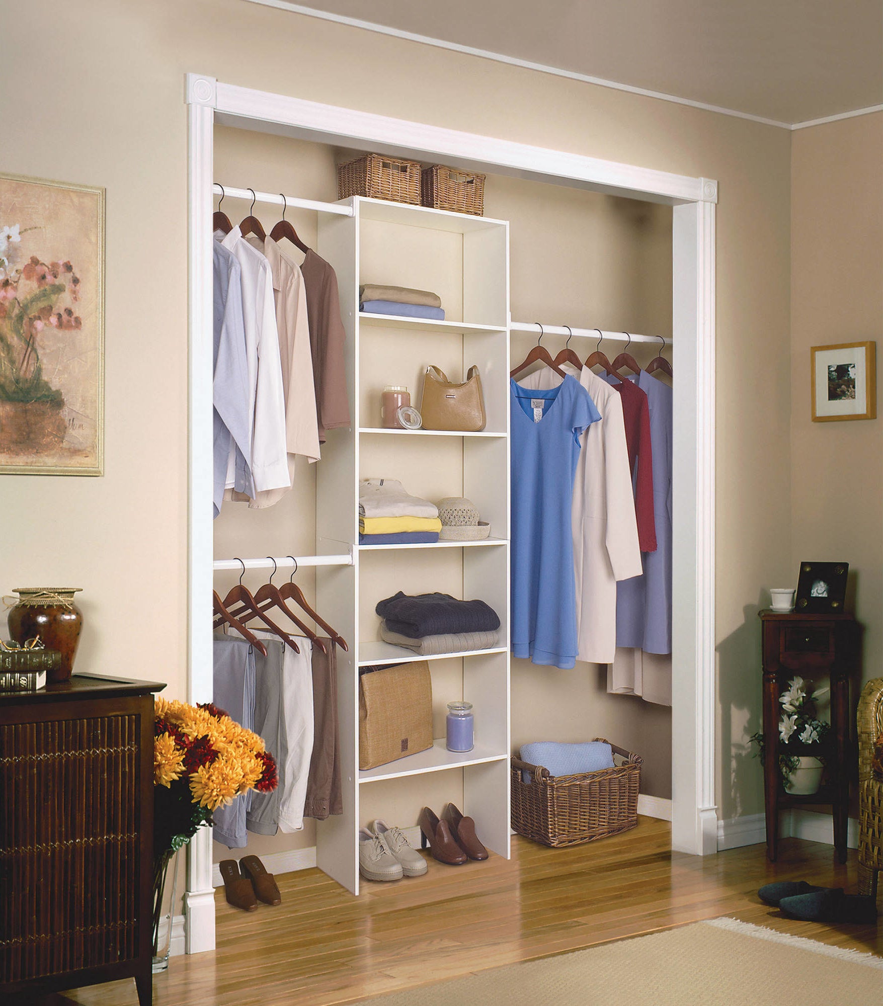 The tall white organizer, with six shelves and three rods, in a closet