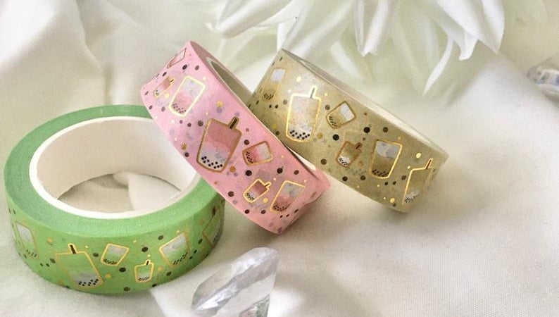 Three rolls of washi tape with gold foil and boba tea