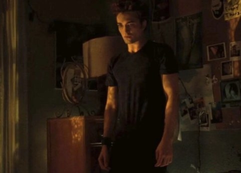 Still from Twilight: Edward standing in Bella&#x27;s bedroom at nighttime