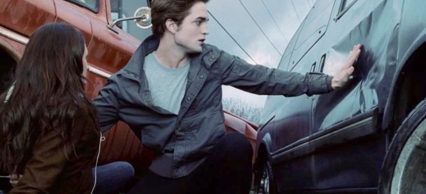 Still from Twilight: Edward saves Bella form an oncoming vehicle 