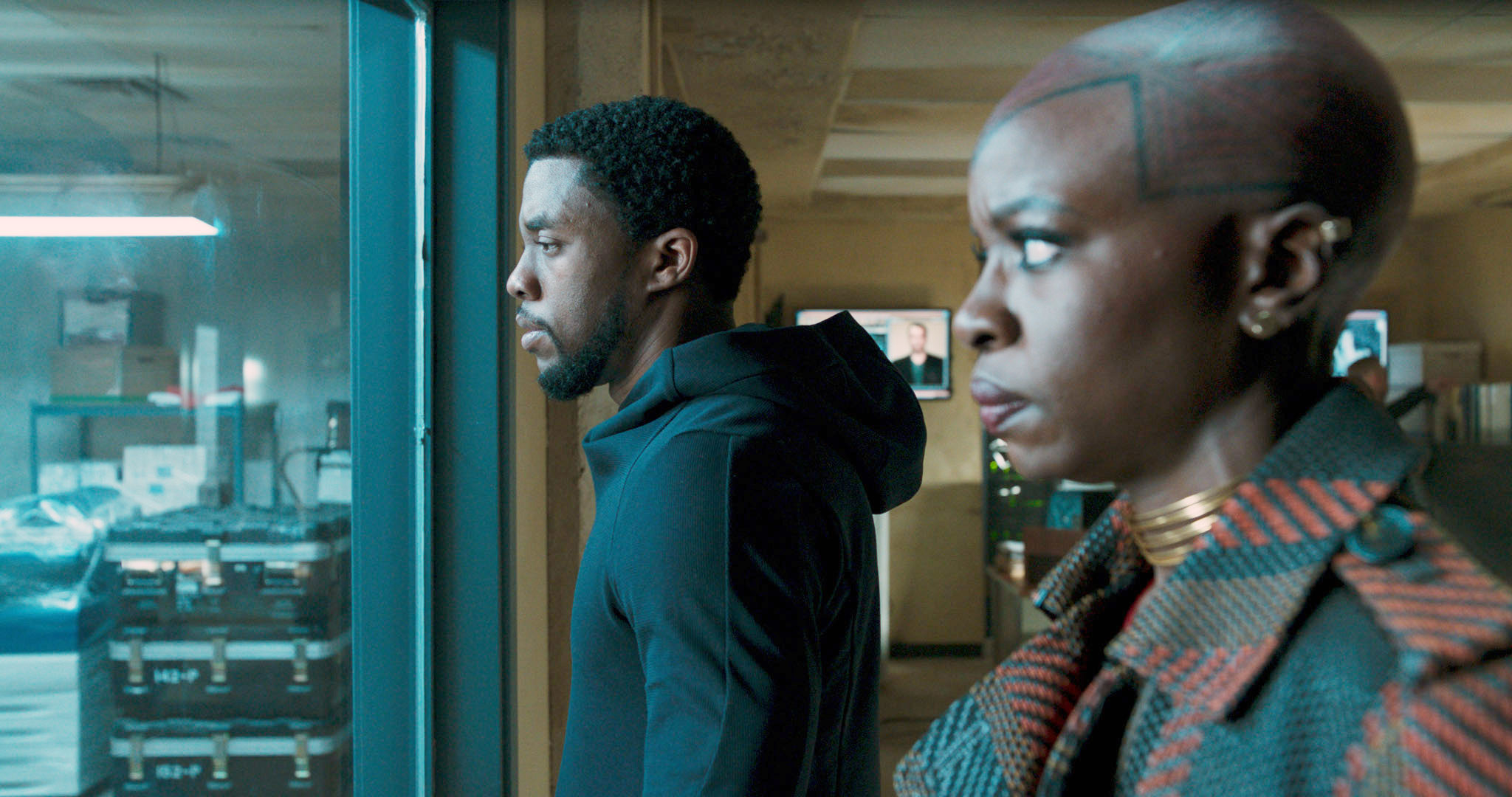 Chadwick Boseman and Danai Gurira staring out a window in &quot;Black Panther&quot;