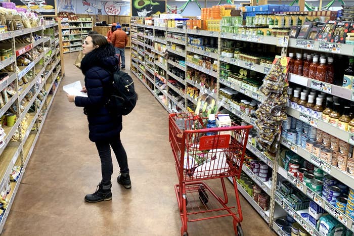 A woman shopping at Trader Joe&#x27;s