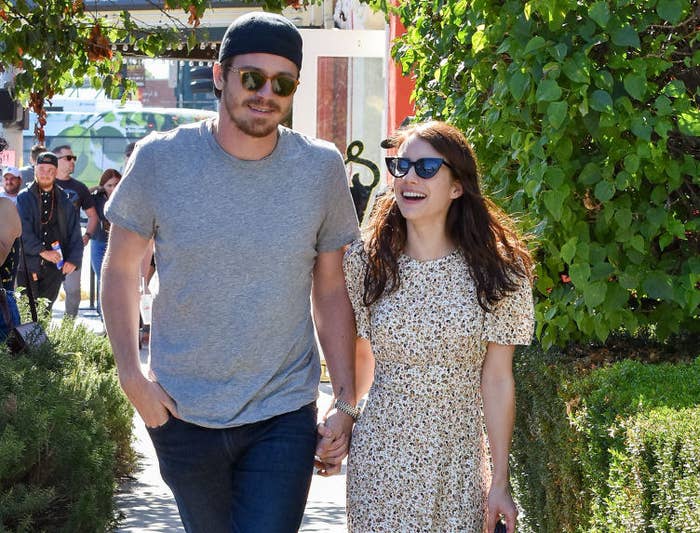 Garrett Hedlund and Emma Roberts walk hand-in-hand in Los Angeles