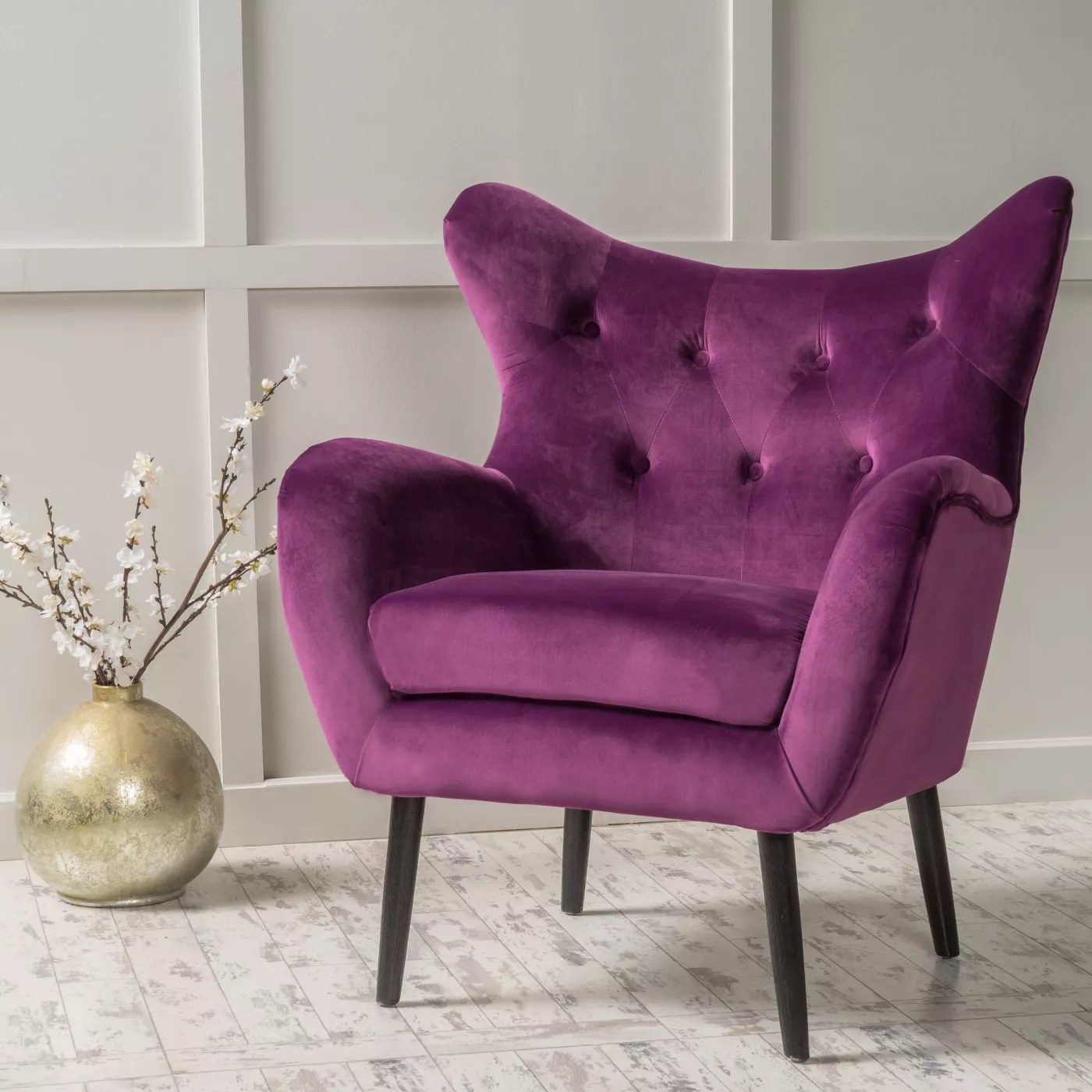 A purple, velvet armchair