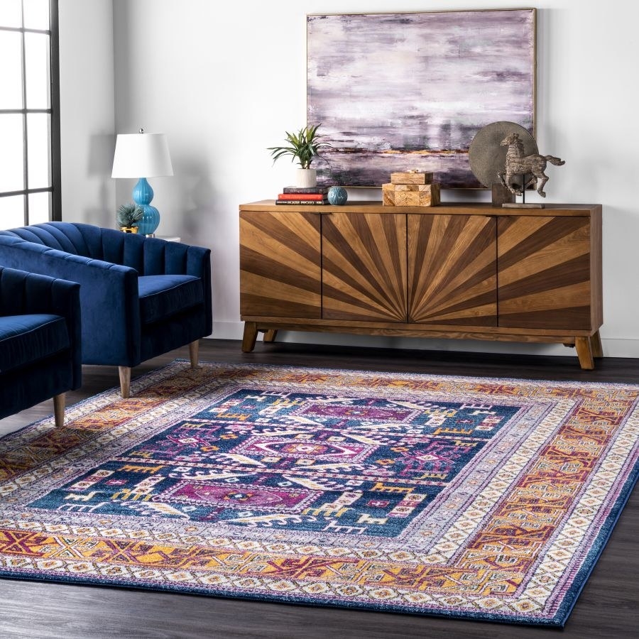 The rug in a colorful navy pattern