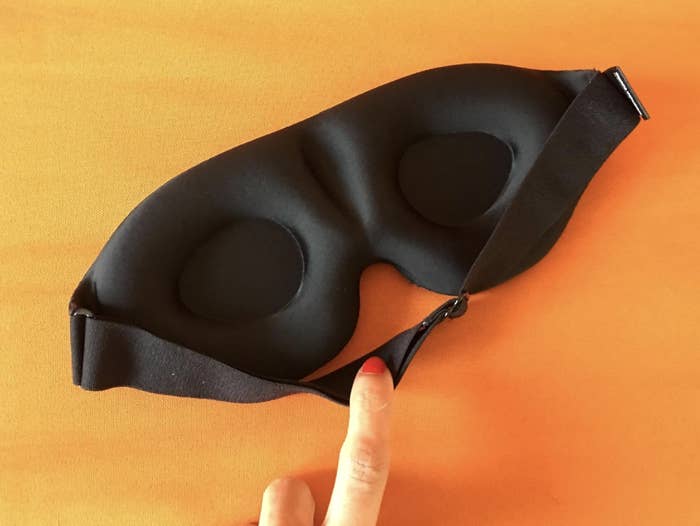 Reviewer image of contoured black sleep mask 