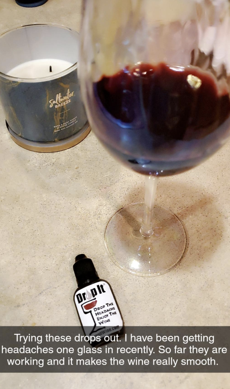 Reviewer image of glass of red wine with a bottle of Drop It, along with a caption explaining that it&#x27;s been working 