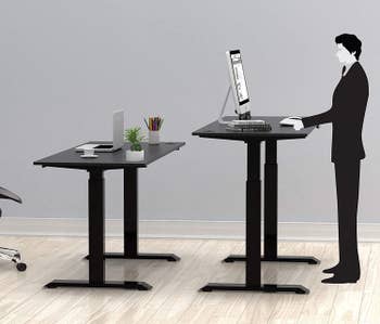 the desk in black in two different height positions