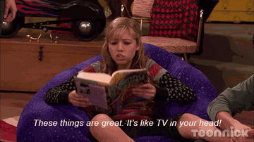 Young person reading a book and exclaiming, &quot;These things are great. It&#x27;s like TV in your head!&quot;