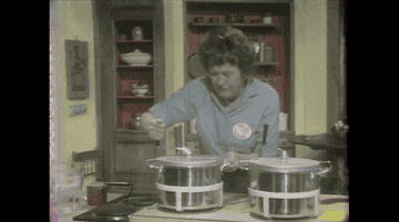 gif of Julia Child using a miller