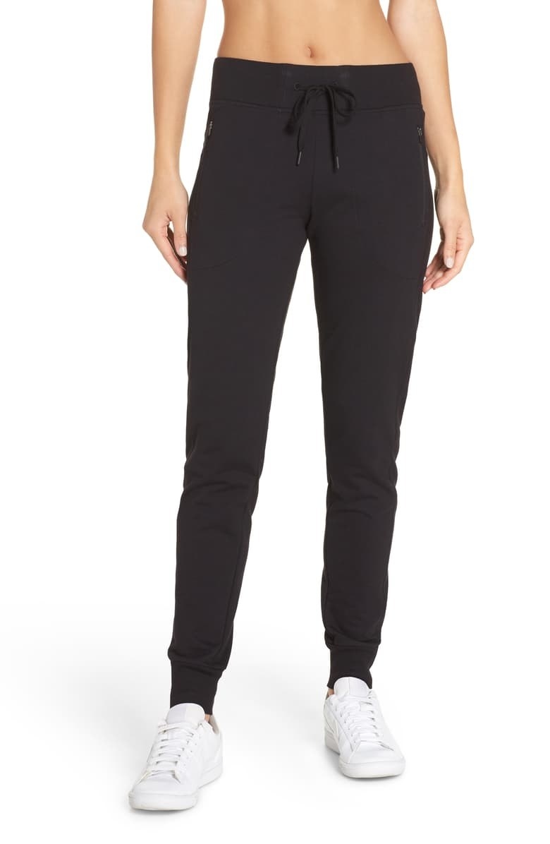 Model wearing Zella jogger pants with elastic drawstring waist and rib-knit cuffs