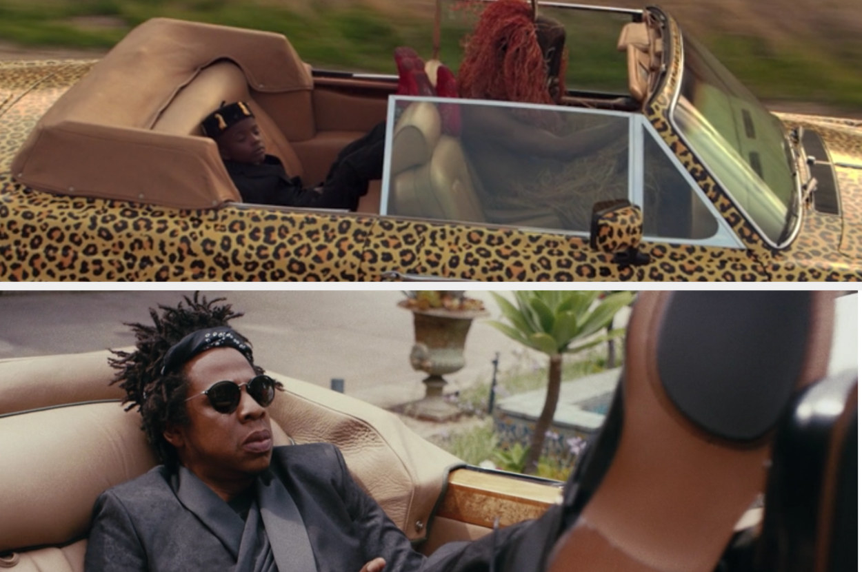 Simba lying in a car and Jay-Z lying in a car