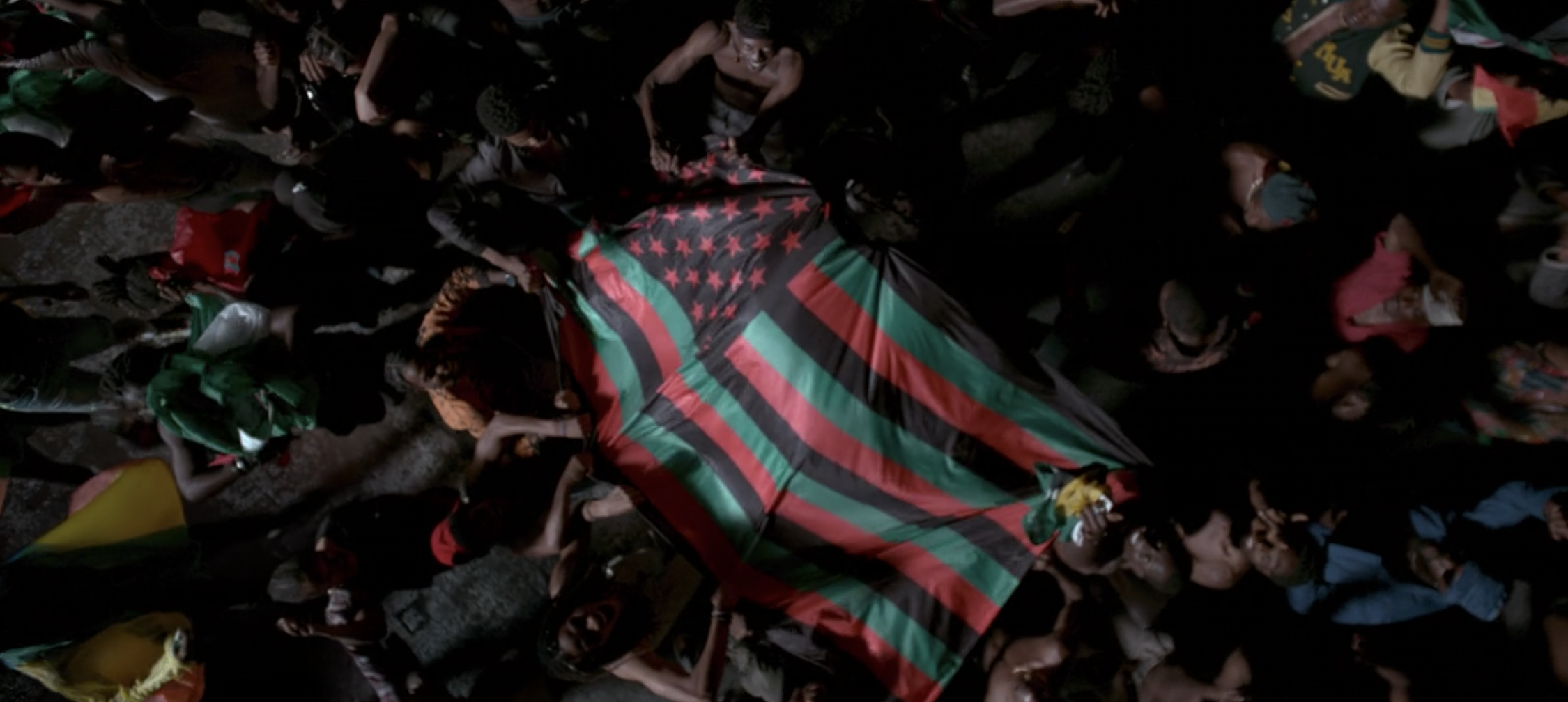 African-American flag held by a bunch of people