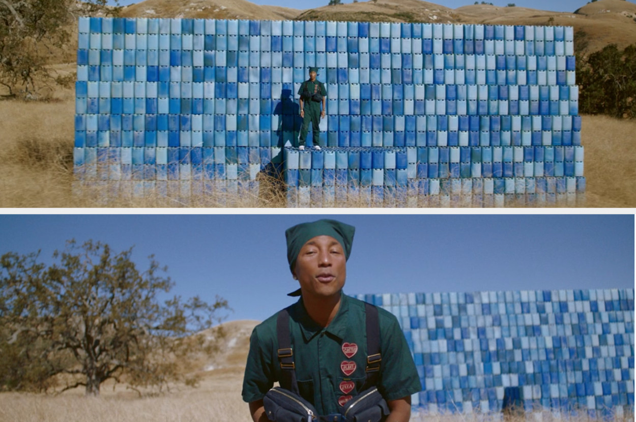 Pharrell singing on a stage of water bottles