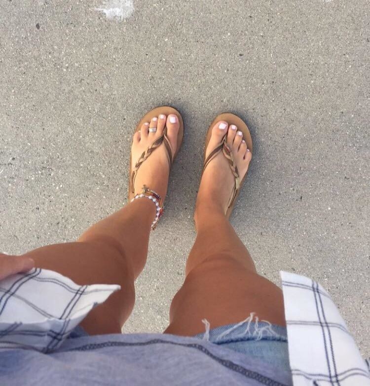 nike sandals on feet