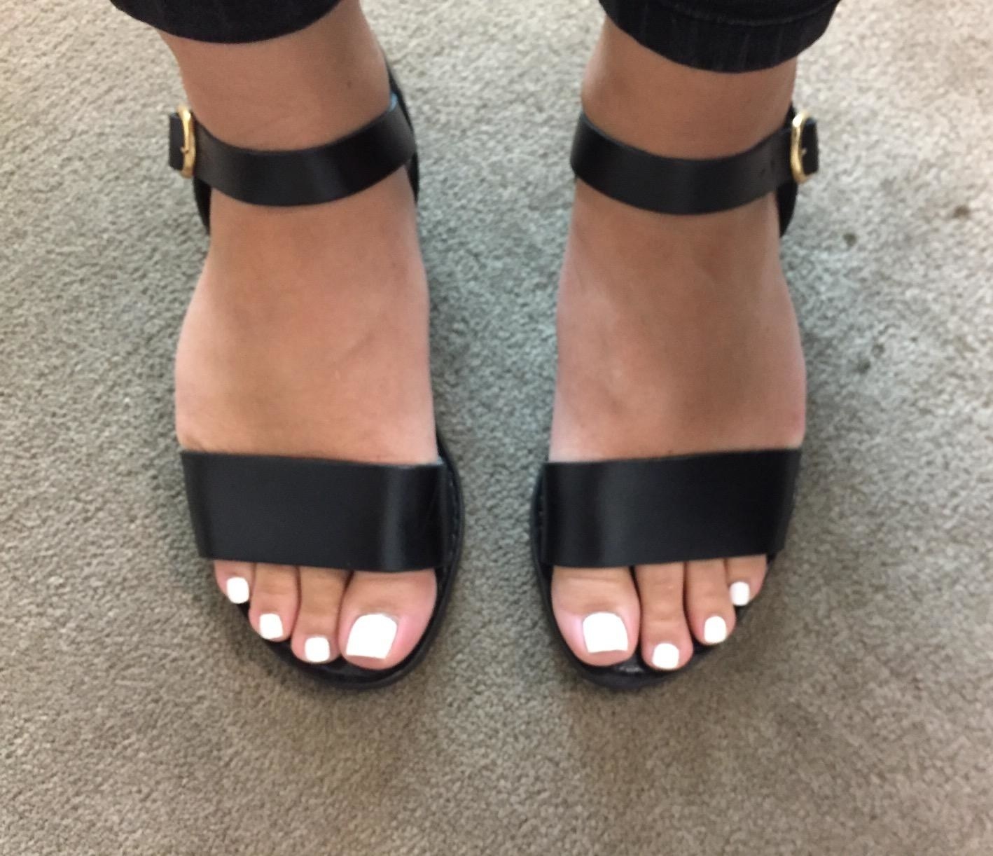 Reviewer in the black flat sandals