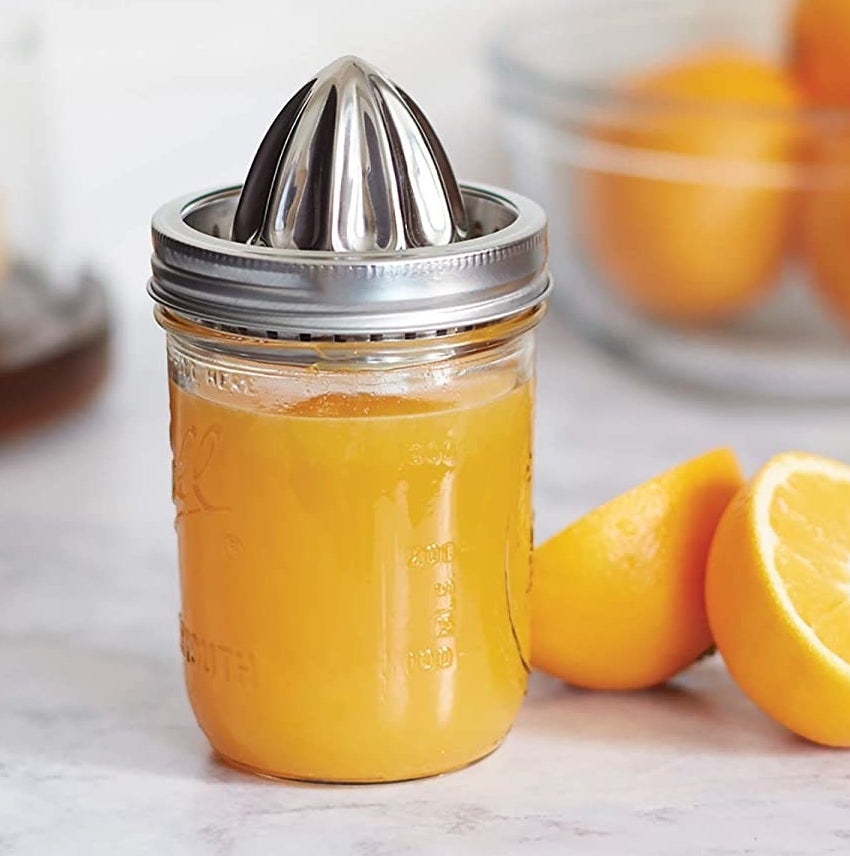 A Mason jar with the juicer cap on it