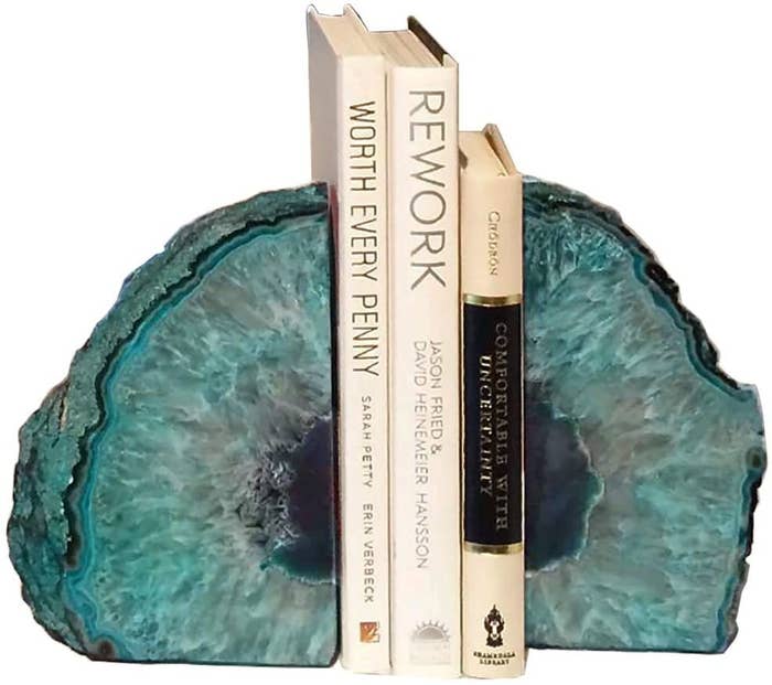 teal agate bookends holding three books