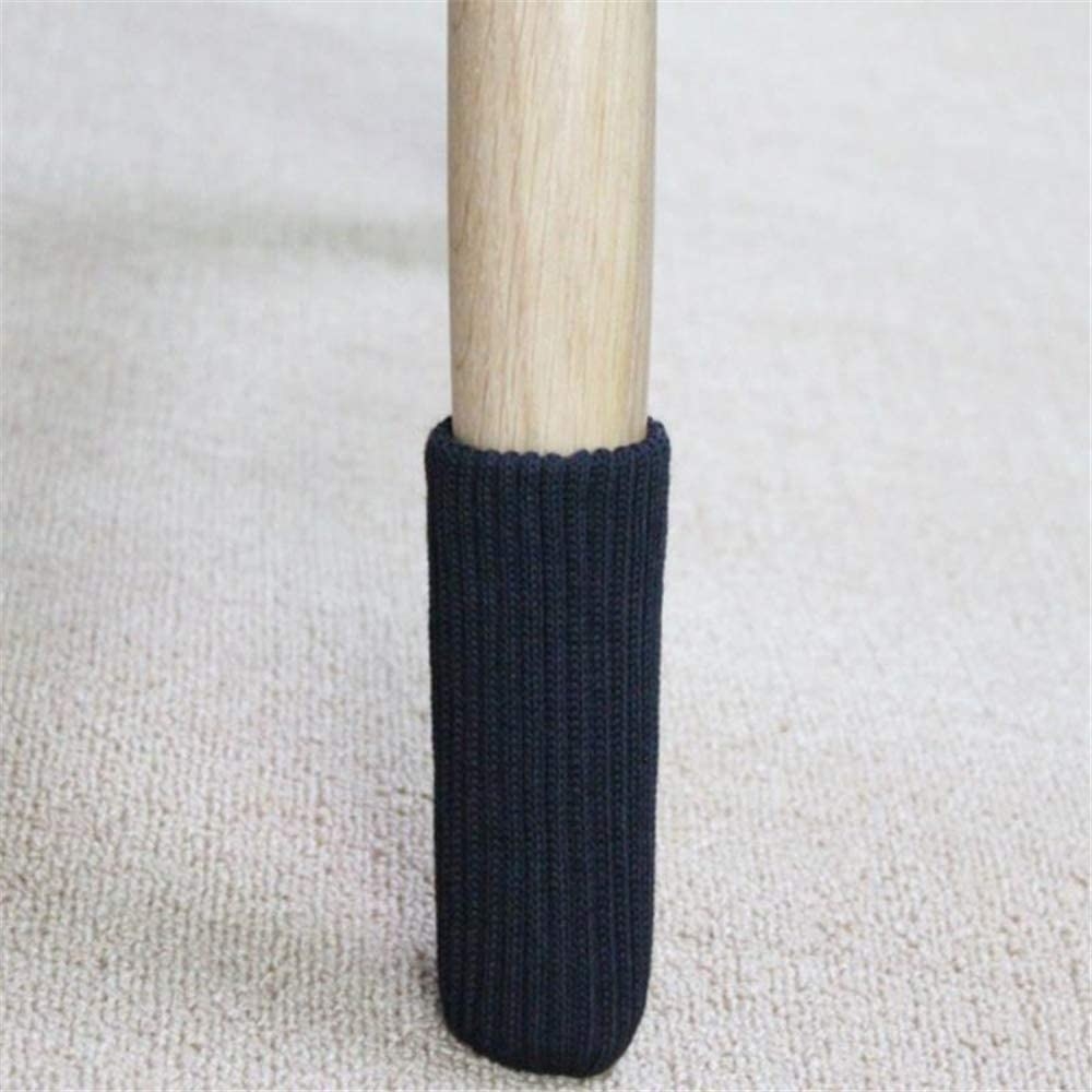 A leg of a chair with the sock on it 