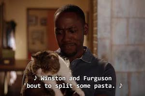 Winston holding ferguson the cat and singing "winston and ferguson 'bout to split some pasta"