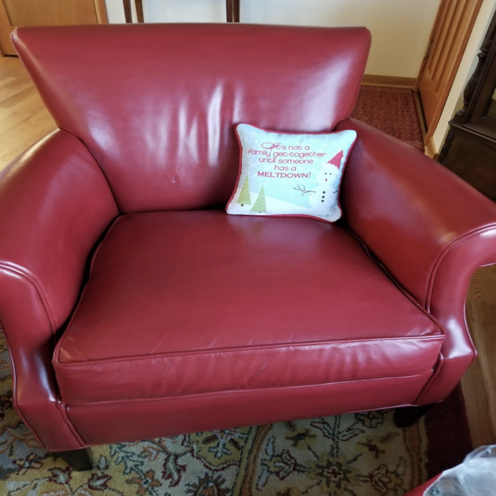 Same reviewer showing the same chair after using the polish to restore a vibrant red color