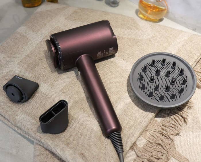 the purple hair dryer with magnetic attachments