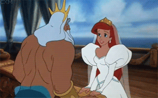 Ariel embracing King Triton