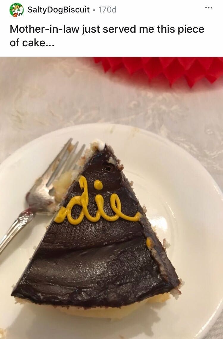 A mother-in-law gives her child&#x27;s spouse a cake slice that says &quot;die&quot; on it