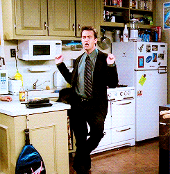 Chandler from Friends dancing in the kitchen