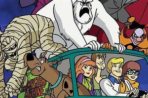 The entire Scooby-Doo gang riding in The Mystery Machine with three Scooby-Doo villains riding on top