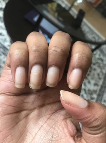 Same reviewer's after photo showing noticeably longer and healthy looking nails