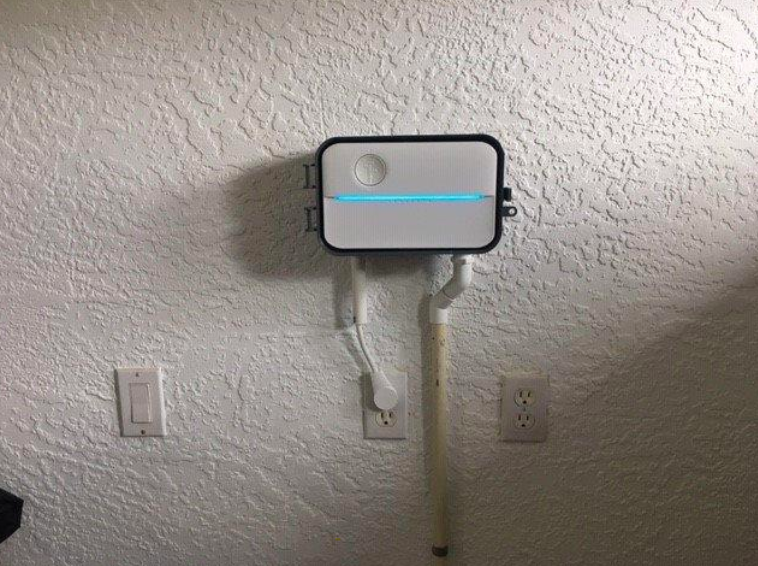 Smart sprinkler system mounted on wall 