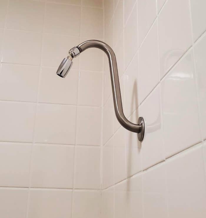 Reviewer photo of low-flow showerhead in shower 