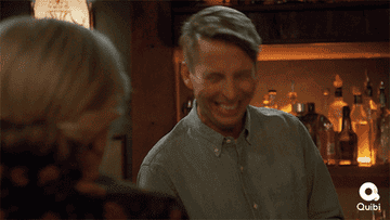 Jack McBrayer laughing.