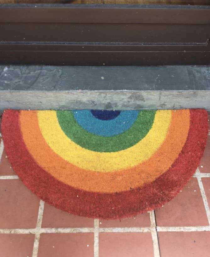 the rainbow half-circle doormat