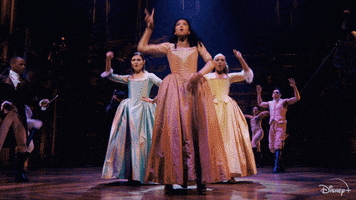 The Schuyler sisters raise their hands in elation and shout &quot;WORK&quot;