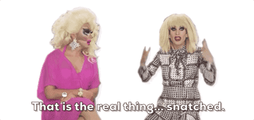 Katya snatches off her own wig to reveal another wig underneath.