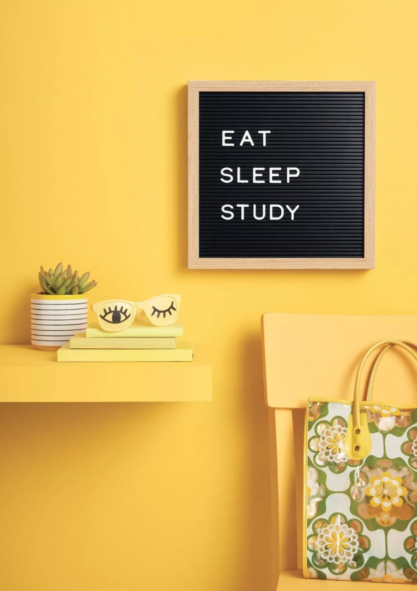 A black board that says Eat Sleep Study on it 